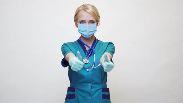 Medical Doctor Nurse Woman Wearing Protective Mask and Latex Gloves - Showing Big Thumb Up