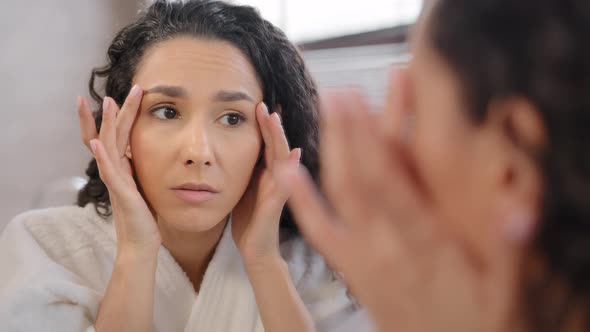 Headshot Upset Worried Sad Woman Looking at Mirror Dissatisfied with Condition of Skin After New