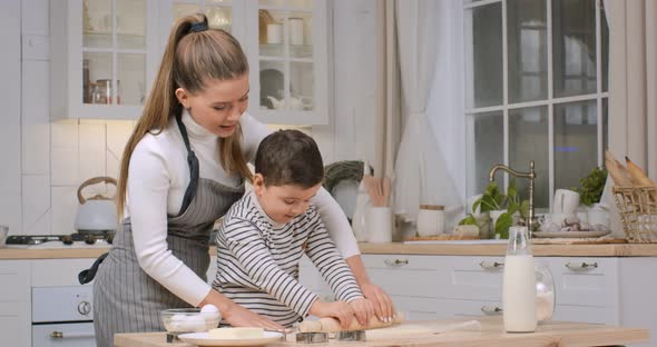 Mother Little Son Making Handmade Cookies Home Rolling Raw Dough Together Kitchen