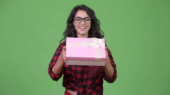 Young Beautiful Businesswoman with Gift Box