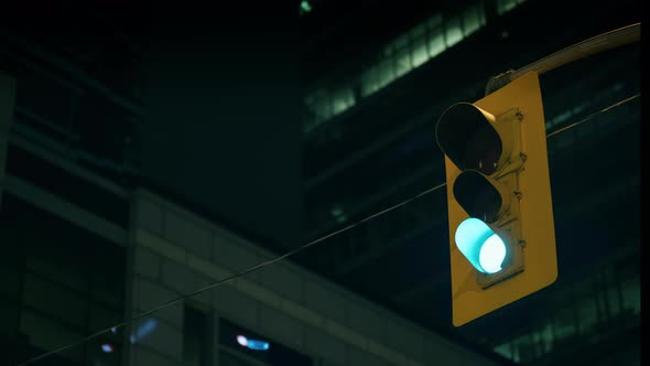 Traffic Light Works Against Background Skyscrapers Night