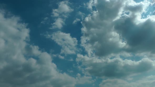 Sun Lights And Summer Rain Cumulus Puffy Clouds On Sky