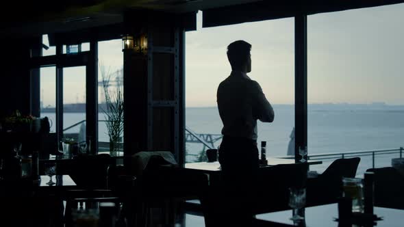 Pensive Man Silhouette Standing Restaurant Hall Alone