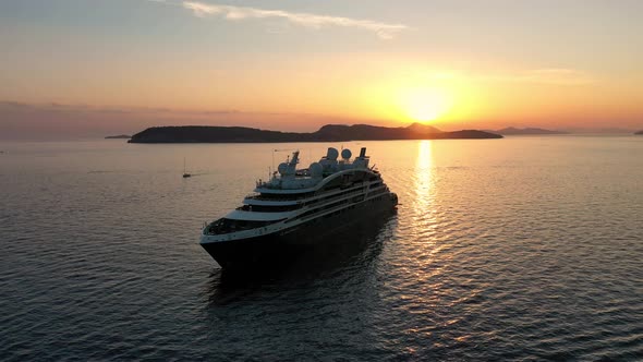 Aerial view at the cruise ship during sunset. Adventure and travel.