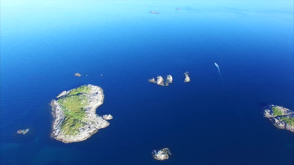 Tiny islands on norwegian coast from air