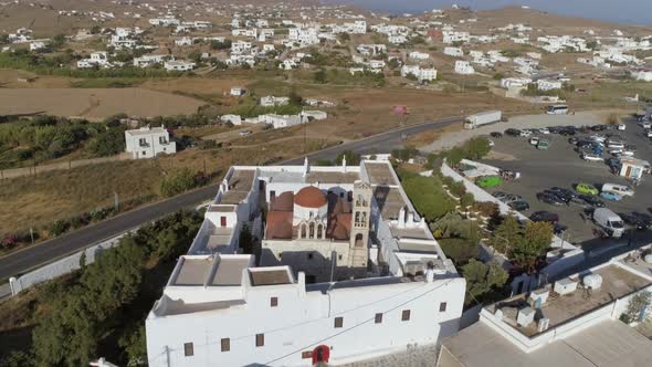 Aerial view of Agios Nikolaos church in Spetses next to a road, Greece.