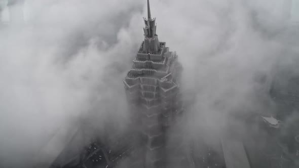 Breathtaking TIME LAPSE: Jin Mao Tower Surrounded By Fog,Clouds Passing By and Car Traffic on