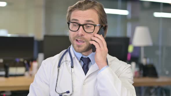 Portrait of Doctor Talking on Smartphone