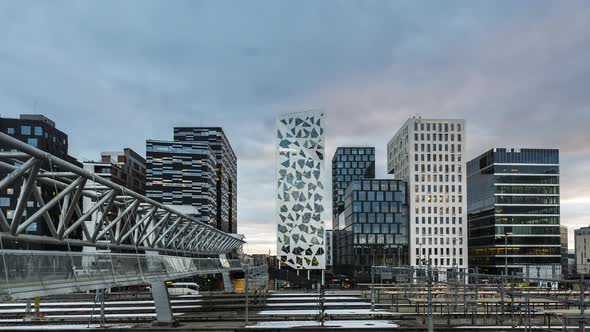 Akrobaten Pedestrian Bridge And Barcode Project In Downtown Oslo, Norway. Day To Night Cityscape Vie