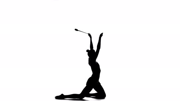 Gymnast Holding a Mace and Professional Bent. White Background. Silhouette