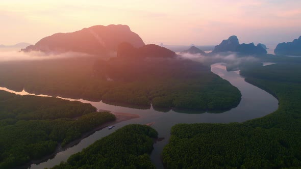 4K : Drone flying above the clouds, Limestone mountains with mangrove