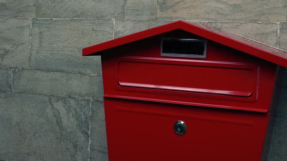 Passing A Letter Box On The Wall