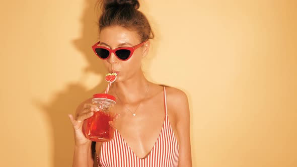 Young beautiful sexy hipster woman in sunglasses