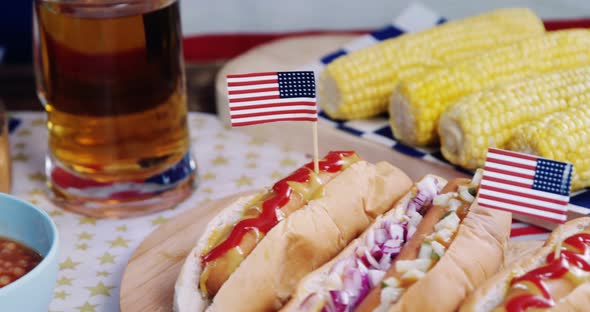 Hot dogs on wooden table with 4th july theme