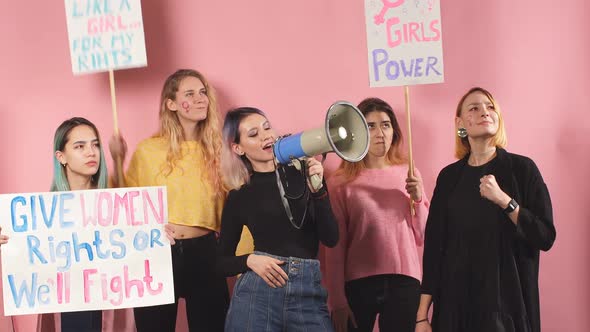 Portrait of Confident Women Fighting for Women Rights Holding Posters