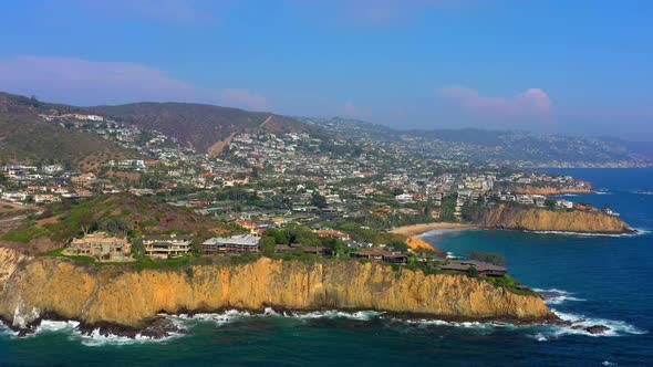 Several very big houses on a cliff in Laguna Beach California