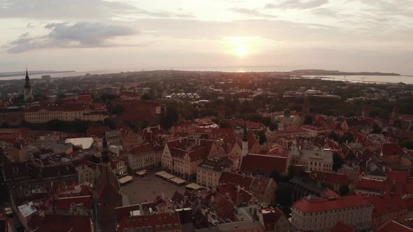 Beautiful Aerial Drone Shot of Old Town of Tallinn Estonia at Sunset