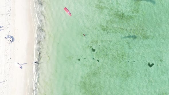 Vertical Video Boats in the Ocean Near the Coast of Zanzibar Tanzania Aerial View