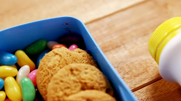 Close-up of cookie with sandwich and confectionery