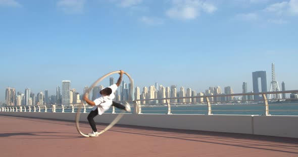 Amazing Wheel Gymnastics Tricks By a Young Athlete Dubai Marina View