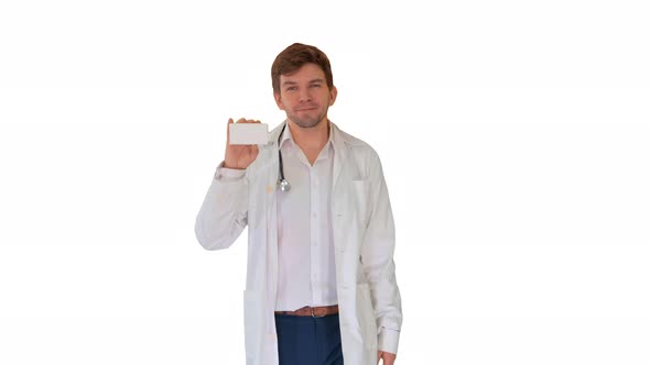 Smiling Male Doctor Walking and Advertising Pills Looking at Camera on White Background