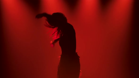 Modern Contemp Dance and Slim Flexible Dancer During Dance Practice in a Dark Studio with Red Lights