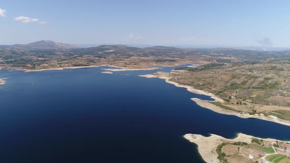 Blue lake and grassland in a sunny day