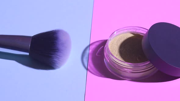 Make Up Concept. Top View of Makeup Brush with Face Powder