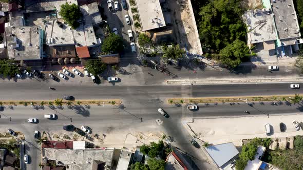 Aerial View of the Street Intersection with Cars Driving Down the Streets