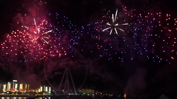 Fireworks on the Background of the Wheel