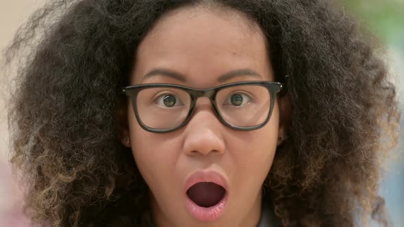 Close Up of Face of Young African Woman with Shock Expression