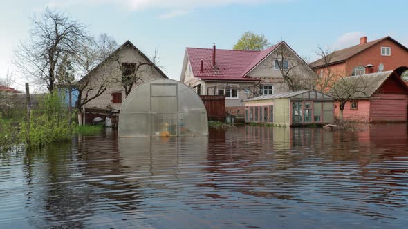 Vegetable Garden Beds In Water During Spring Flood Floodwaters During Natural Disaster