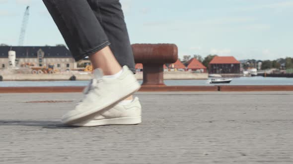 Woman's Legs Walking By the Dockside in Copenhagen During Summer