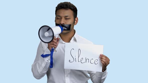 Silenced Indian Man Holding Megaphone.