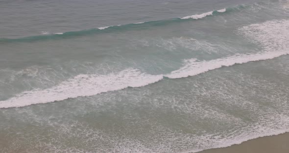 Cornwall seaside view with waves and cliffs