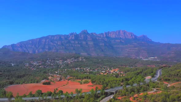 013_OJRA.UAS_Mountain_Montserrat_Catalonia_Spain_4KGeneral plane in frontal traveling of the mounta