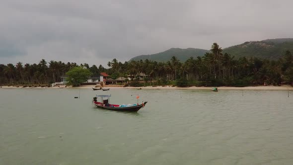 Beatiful Cinematic Sea View and Flying to Fishing Boat on Thai Island