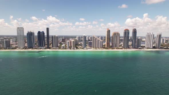 5k aerial side view of Sunny Isles Beach. Miami drone footage. 