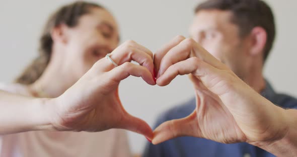 Happy young caucasian couple in love spending valentines day at home