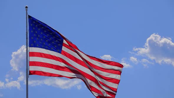 The flag of the United States of American blowing in the wind