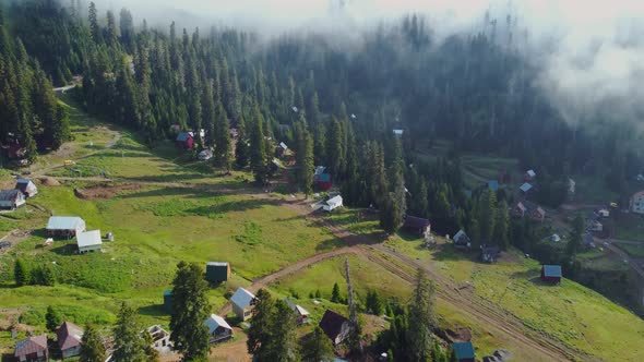 Misty Aerial View Of High Mountain Village