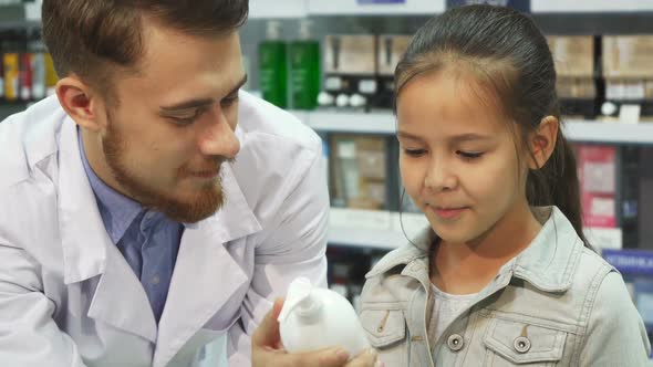 A Young Customer Chooses Which Item To Buy with the Help of an Apothecary