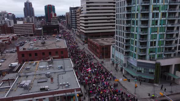 Crowd with speaker wide slowly circling Calgary Protest 12th Feb 2022