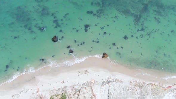 Top Down View Of Turquoise Sea In Aquinnah, Martha's Vineyard Island, Massachusetts - aerial drone s