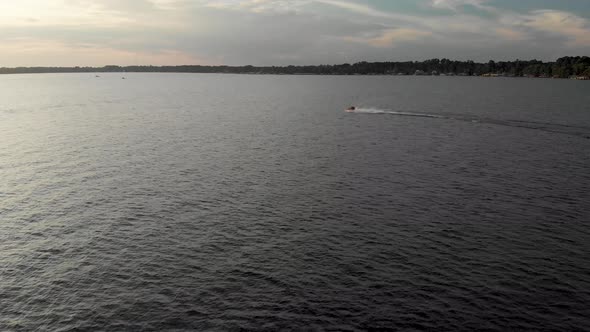 drone shot jet ski passing by