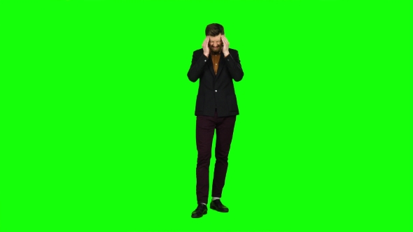 Guy Is Suffering, His Head Hurts, He Is Tired. Green Screen