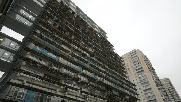 Scaffolding to the Side of a Highrise Residential Building