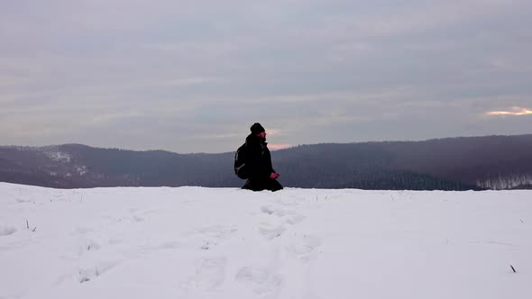 Hiker meditating after a day hike