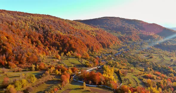 Aerial View of of the Small Village High Mountain in Morning Time with Beautiful Autumn Nature