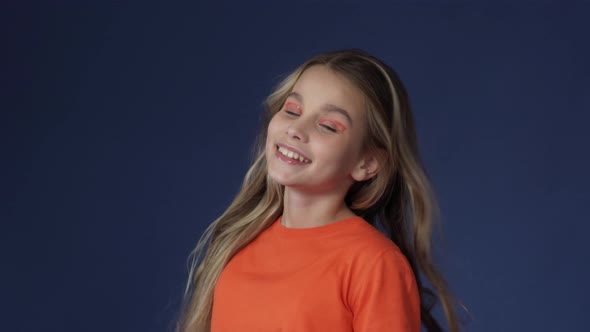 A Young Girl Waving Long Hair